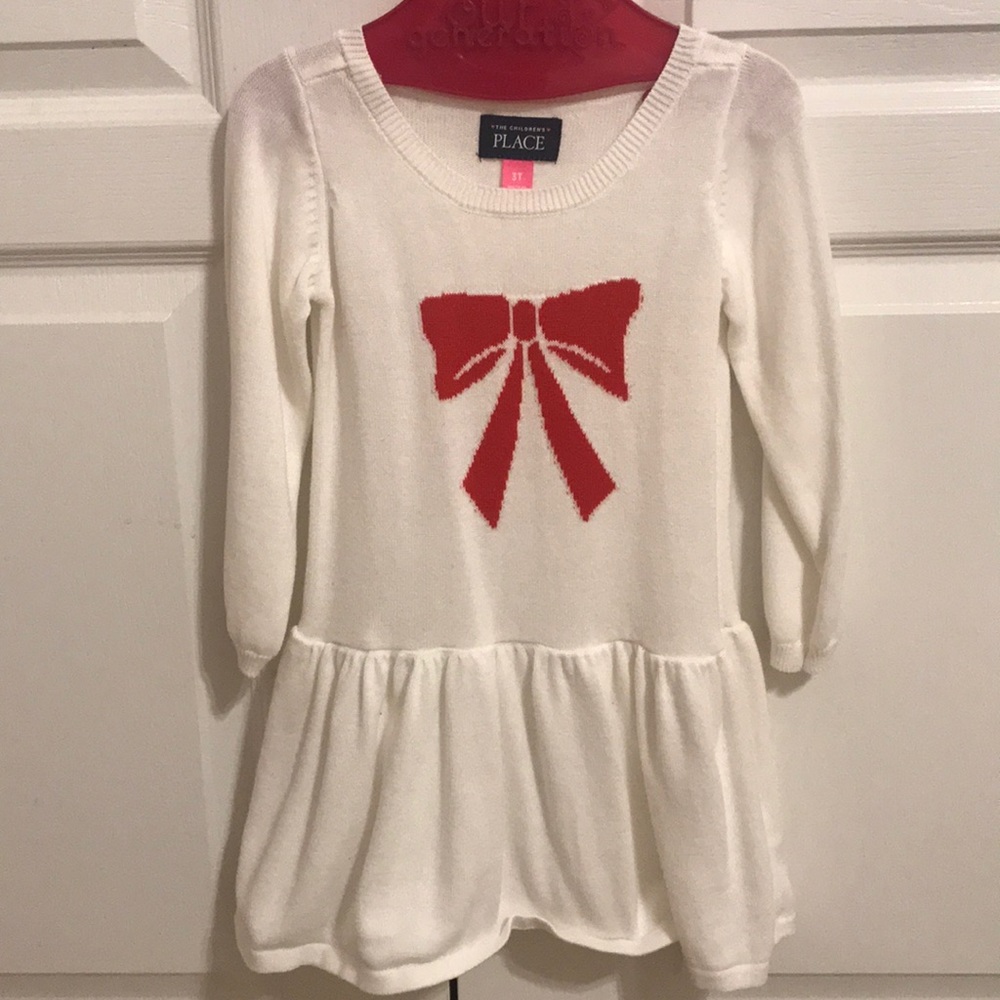 White dress with red bow